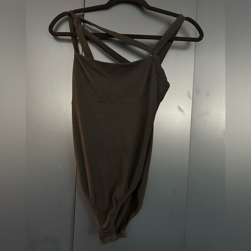 Black bodysuit with asymmetric straps